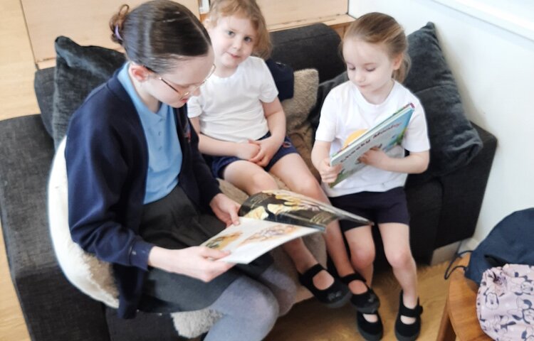 Image of Reception Reading with Year 5